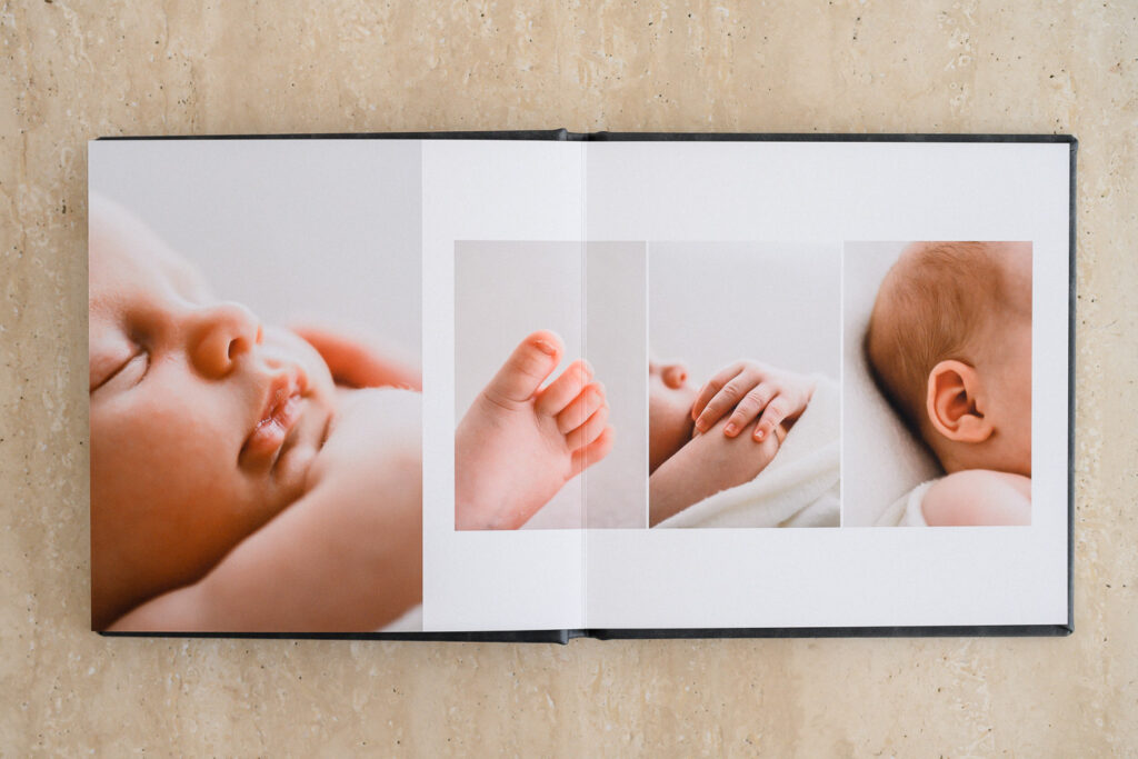 Fine art newborn heirloom album featuring close-up macro photos of newborn baby’s lips, eyelashes, hands, and feet 