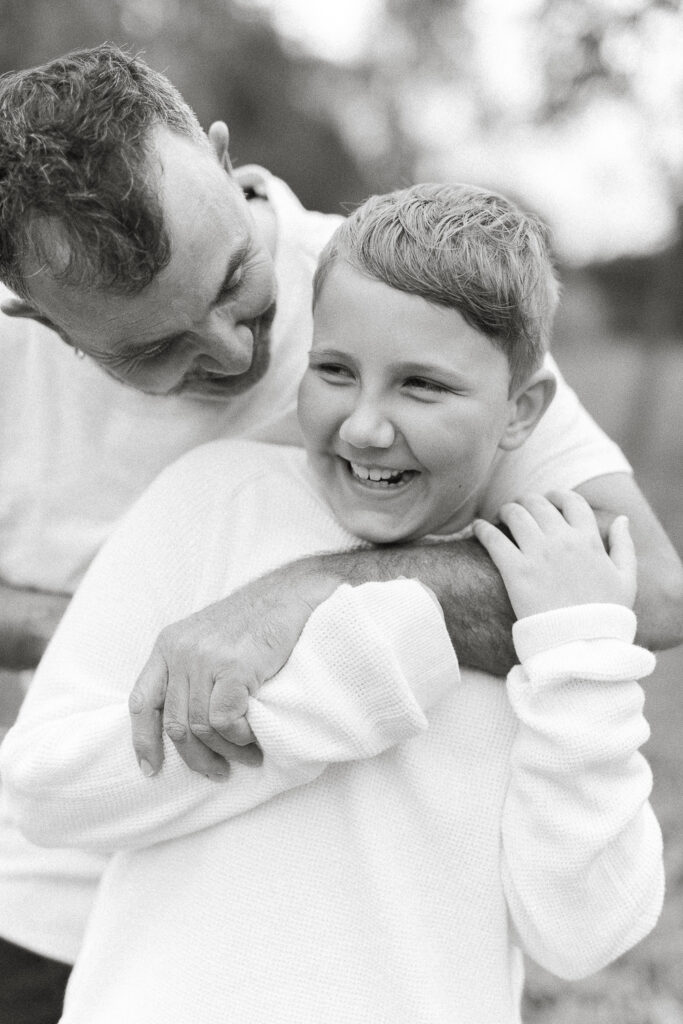 Family photography Sydney – photographer capturing candid moments during outdoor session